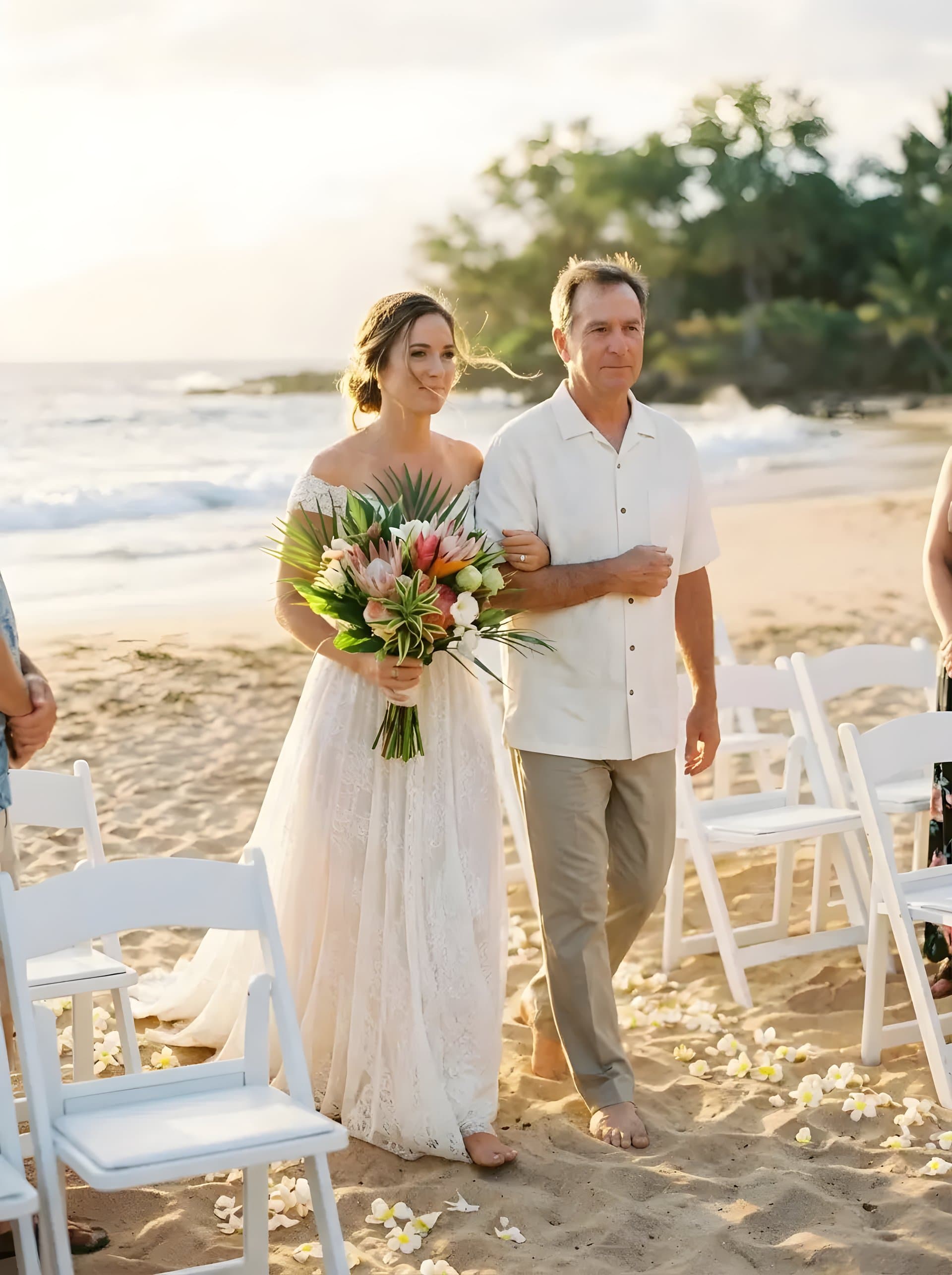 Sarah walking down the sand aisle at Makena Beach